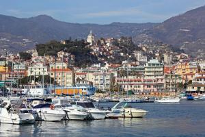 a bunch of boats are docked in a harbor at Andres Guest House Sanremo in Sanremo