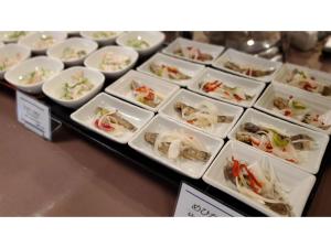 a display case filled with different types of food at Nobeoka Urban-Hotel - Vacation STAY 30534v in Nobeoka