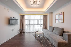TV a/nebo společenská místnost v ubytování Haeundae Centum Hotel