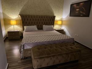 Katil atau katil-katil dalam bilik di The Executive 1BHK Luxury Apt Self Check-in