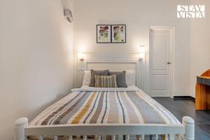 Ένα ή περισσότερα κρεβάτια σε δωμάτιο στο StayVista at Mathikettan Homestay - Pet Friendly & Heater +13 φωτογραφίες