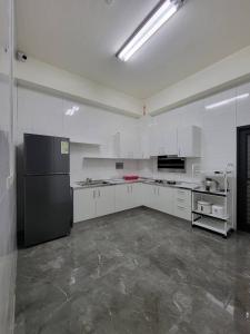 Una cocina o kitchenette en 玩樂夷夏民宿