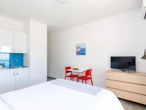 เตียงในห้องที่ Apartments Villa Lukas - ''No 6'' Studio Apartment with Balcony and Sea View +31 ภาพ