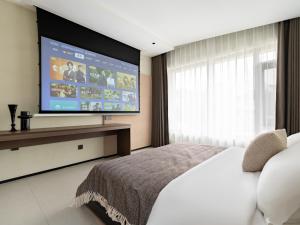 TV a/nebo společenská místnost v ubytování 257 Summer Hotel