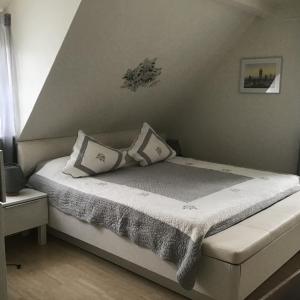 Postel nebo postele na pokoji v ubytování Chambres d hôte Clos du Noyer