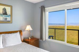 Postel nebo postele na pokoji v ubytování Hi-Tide Resort