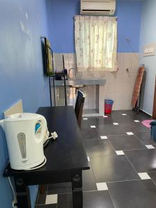Kuchyň nebo kuchyňský kout v ubytování Ayem Homestay UTHM