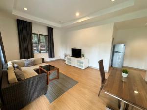 TV a/nebo společenská místnost v ubytování Samui Garden Home