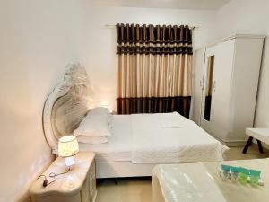 Postel nebo postele na pokoji v ubytování Cheap Holiday Home + 28 fotografií