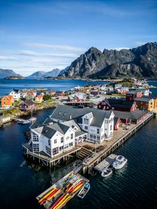 an aerial view of a harbor with boats in the water at Villa Bryggekanten - by Classic Norway Hotels in Henningsvær