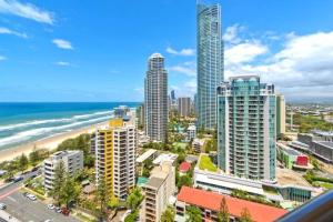 a view of a city with the beach and buildings at Oceanfront 24th Floor 1 Bedroom Retreat with Stunning Views & Free Parking in Gold Coast