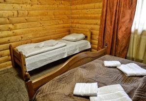 Letto o letti in una camera di Gotel Milenium