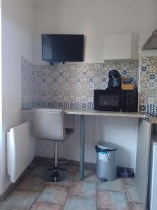 Η κουζίνα ή μικρή κουζίνα στο Le Lumineux