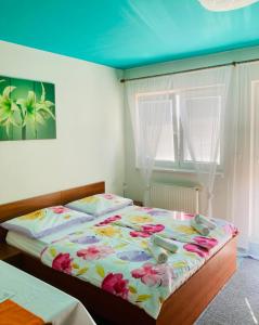 Voodi või voodid majutusasutuse Apartmány, Penzion, Wellness U zlaté rybky toas