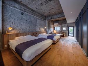 Arcade Hotel房間的床