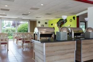 Restaurace v ubytování Enzo Hotels Bulgneville by Kyriad Direct