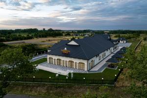 an overhead view of a building with a roof at Pensjonat Miedziana Perła LUBIN in Lubin
