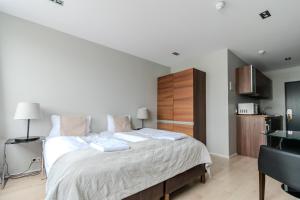 Postel nebo postele na pokoji v ubytování Máni Apartments