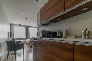 Kuchyň nebo kuchyňský kout v ubytování Máni Apartments