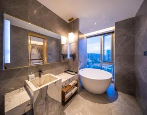 Koupelna v ubytování Maison New Century Hotel Cixi Hangzhou Bay