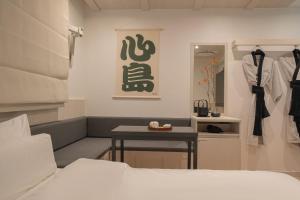 Simdo Hotel&Spa Sillim by Aank客房内的一张或多张床位