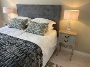 Una cama o camas en una habitación de Seapoint Pearl