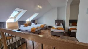 Ένα ή περισσότερα κρεβάτια σε δωμάτιο στο ZABRZE Apartamenty Kościuszki 30