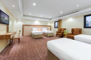 TV a/nebo společenská místnost v ubytování Palestine Hotel Makkah