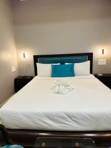Areca Palms Hotel & Resort客房内的一张或多张床位