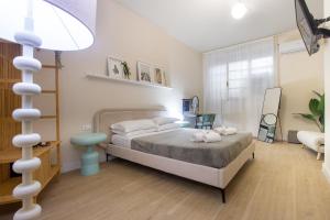 Postel nebo postele na pokoji v ubytování Aureum Angelicum + 23 fotografií