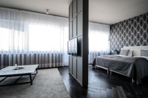 Postel nebo postele na pokoji v ubytování Máni Apartments
