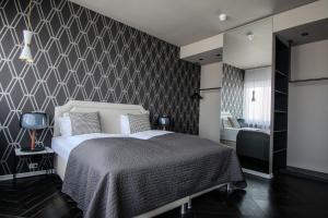 Postel nebo postele na pokoji v ubytování Máni Apartments