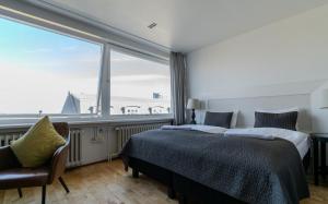 Postel nebo postele na pokoji v ubytování Máni Apartments