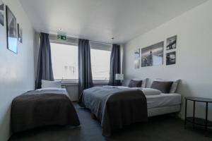 Postel nebo postele na pokoji v ubytování Máni Apartments