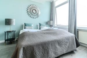 Postel nebo postele na pokoji v ubytování Máni Apartments