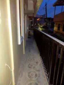 Balkón nebo terasa v ubytování Bahay ni Ate Rose