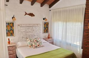 Posteľ alebo postele v izbe v ubytovaní Apartamento Chinarejo