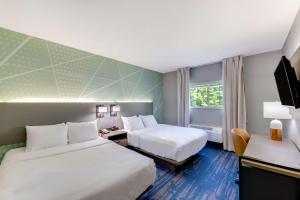 Postel nebo postele na pokoji v ubytování Comfort Inn & Suites Weston - Wausau