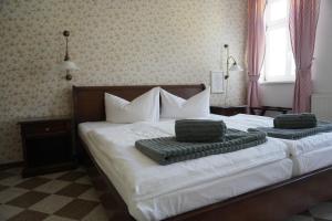 Voodi või voodid majutusasutuse Hotel & Restaurant zur Post toas