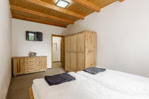 Letto o letti in una camera di Chata Bramberk