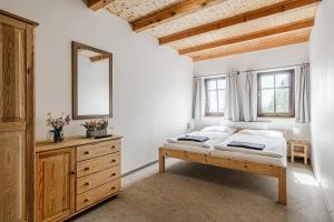 Letto o letti in una camera di Chata Bramberk