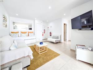 TV a/nebo společenská místnost v ubytování Apartment Praia Rocha Vista Mar Sand