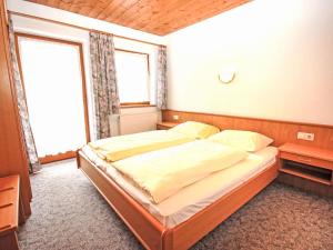Postel nebo postele na pokoji v ubytování Apartment Voithofer-1 by Interhome + 6 fotografií