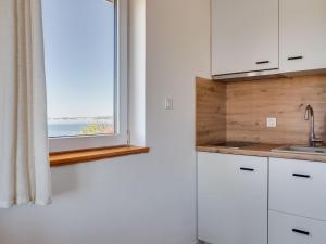Küche/Küchenzeile in der Unterkunft Apartment Bonex-2 by Interhome