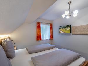 Postel nebo postele na pokoji v ubytování Apartment Karlspitz by Interhome