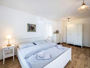 Postel nebo postele na pokoji v ubytování Apartment Zvonková by Interhome