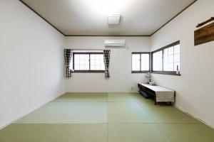 Postel nebo postele na pokoji v ubytování 東京芳华驿站