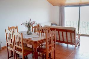 Posezení v ubytování El Portal de la Irene Apartamentos Rurales