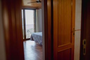 Postel nebo postele na pokoji v ubytování El Portal de la Irene Apartamentos Rurales