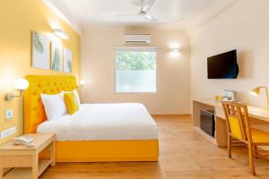 Postel nebo postele na pokoji v ubytování Bloom Hotel - CR Park
